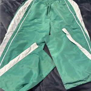ALO Yoga racetrack pants color:lettuce with White Stripes size medium